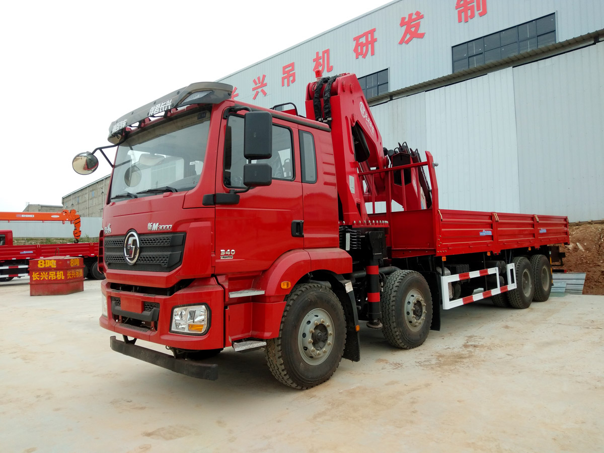 陜汽德龍新M3000牽引頭上裝長(zhǎng)興40噸折臂式吊機(jī)